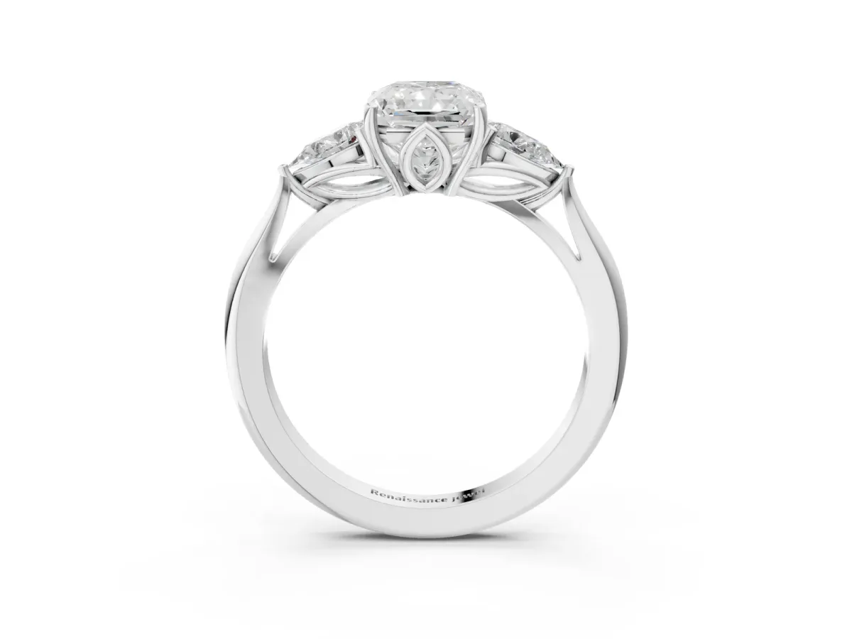 Three-Stone Radiant Cut Diamond Ring with Pear Side Stones in Four-Prong Setting Platinum