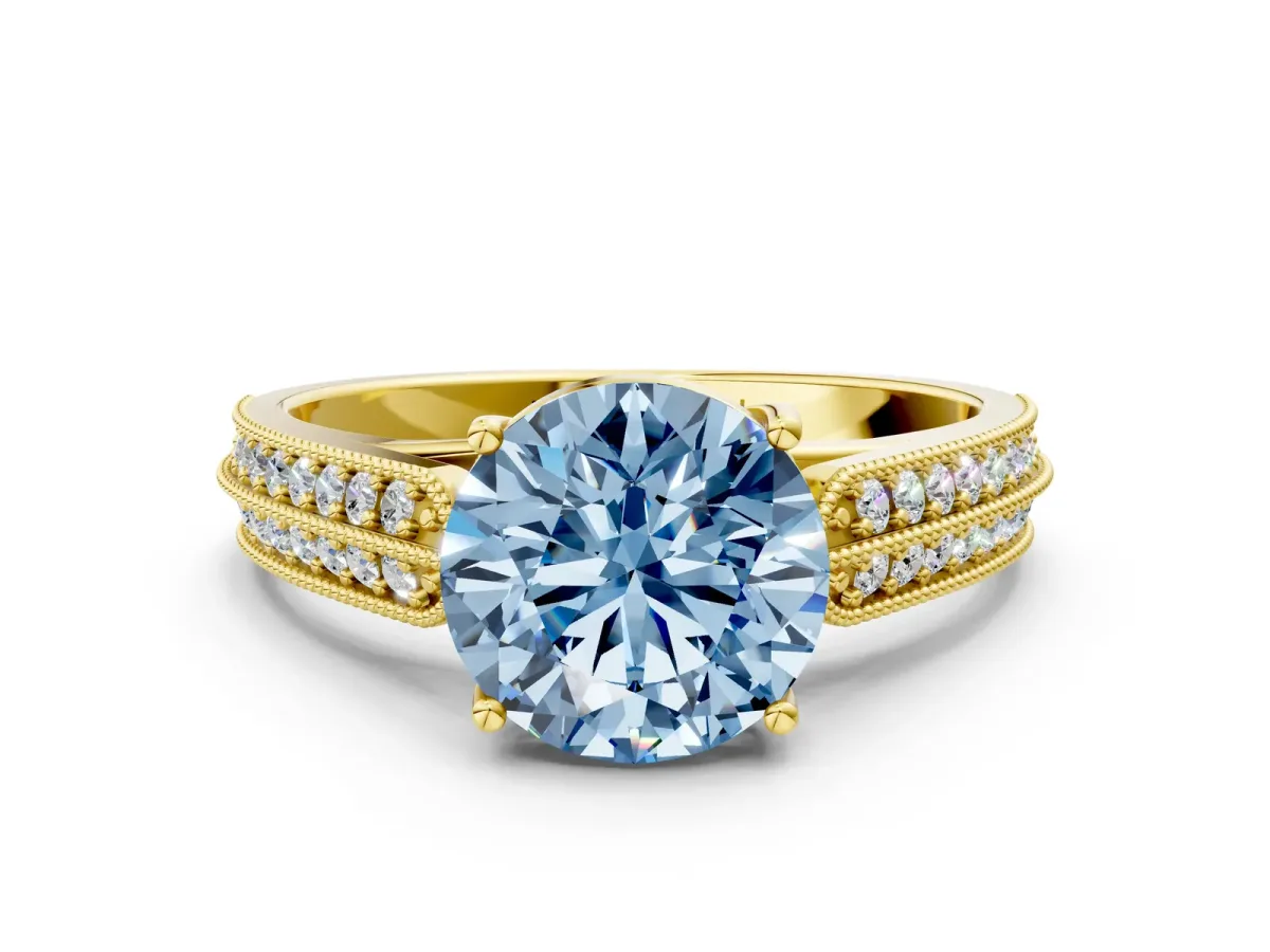 Fancy Blue Round Cut Cut Pave Split Shank Engagement Ring with Four-Prong Setting Yellow gold