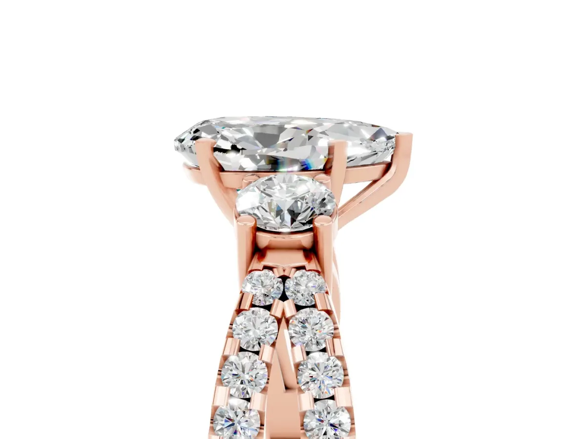 Pear Cut Moissanite Three-Stone Ring with Pavé Split Shank and Four-Prong Setting Rose gold