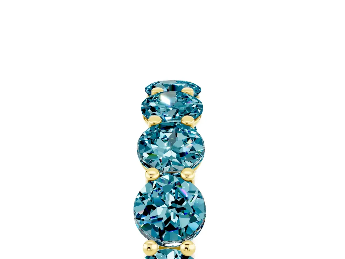 Round Blue Topaz Shared Prong Eternity Band Yellow gold