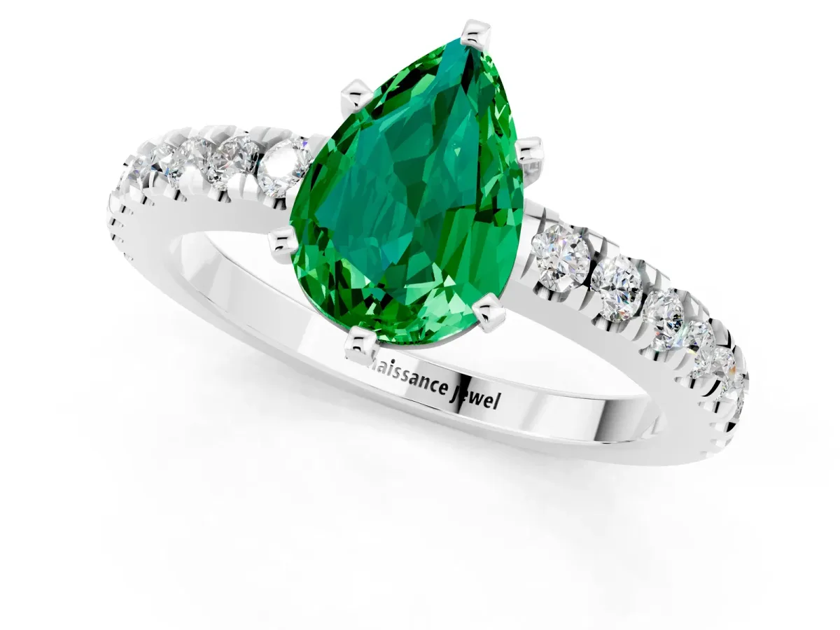 Pear Cut Solitaire Emerald with Pavé Band and Four-Prong Setting Silver
