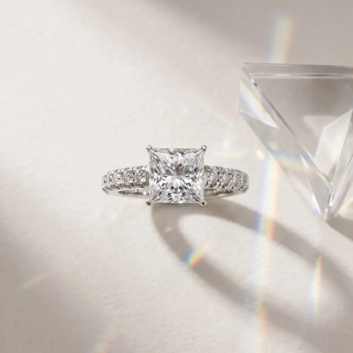 Princess Cut Diamond Cathedral Solitaire Ring with Round Pavé Band Platinum