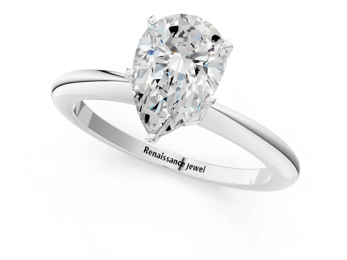 Pear Cut Diamond Solitaire Ring with Six-Prong Setting and Classic Band Silver