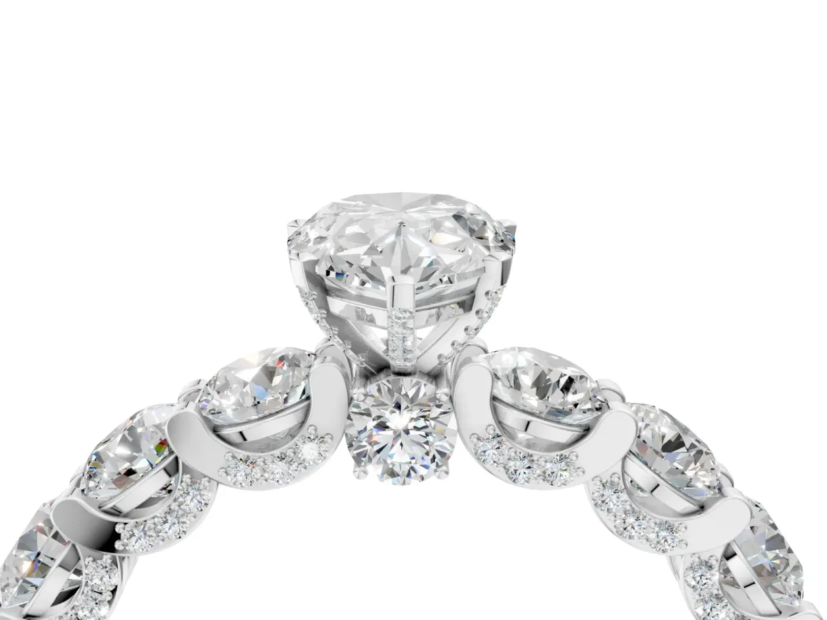 Pear Cut Diamond Side Stone Engagement Ring with Four-Prong Setting White gold