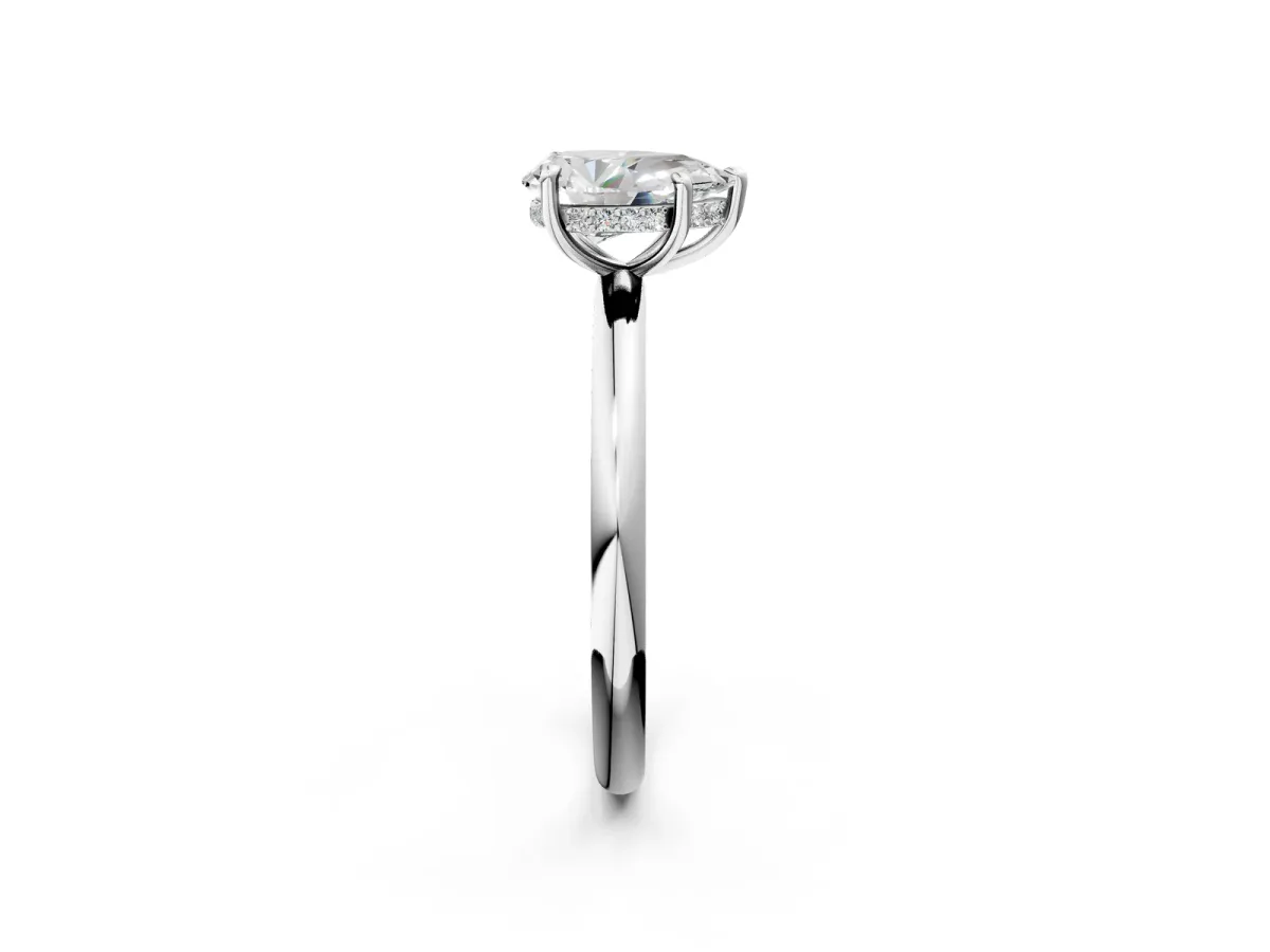 Pear Cut Diamond Solitaire Ring with Thin Band and Four-Prong Setting Silver