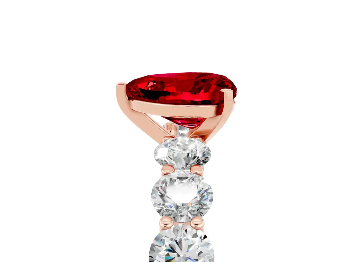 Heart Cut Ruby Prong Setting with Side Stones on a Pave Band Rose gold