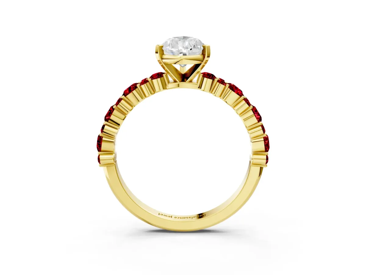 Pear Cut Diamond Side Stone Solitaire Ring with Round Ruby and Four-Prong Setting Yellow gold