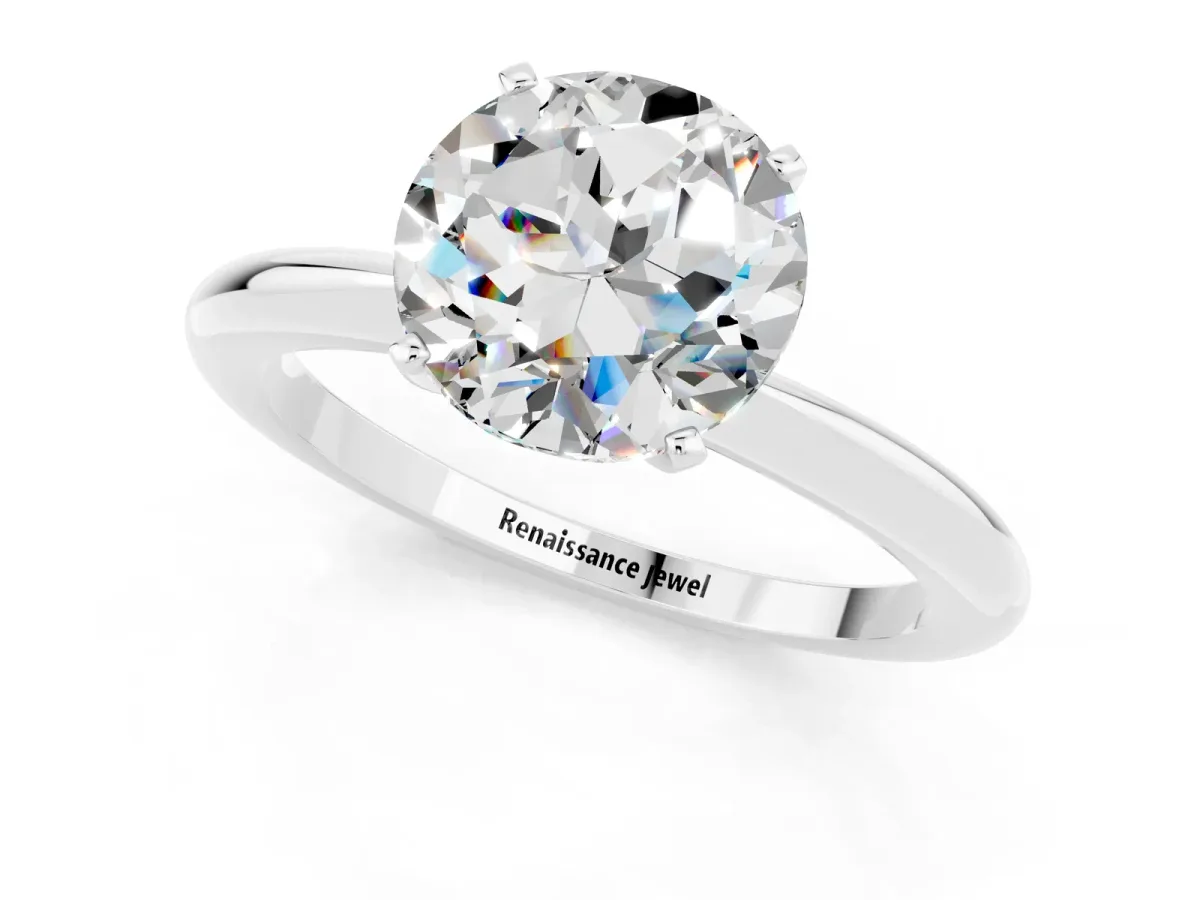 Round Cut Moissanite Solitaire Ring with Six-Prong Setting and Classic Band Silver