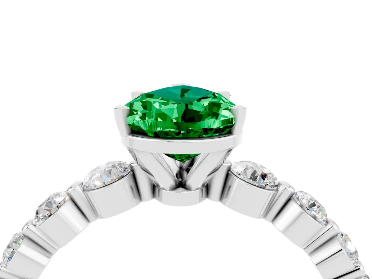 Pear Cut Solitaire Emerald Ring with Pave Band and Four-Prong Setting Platinum