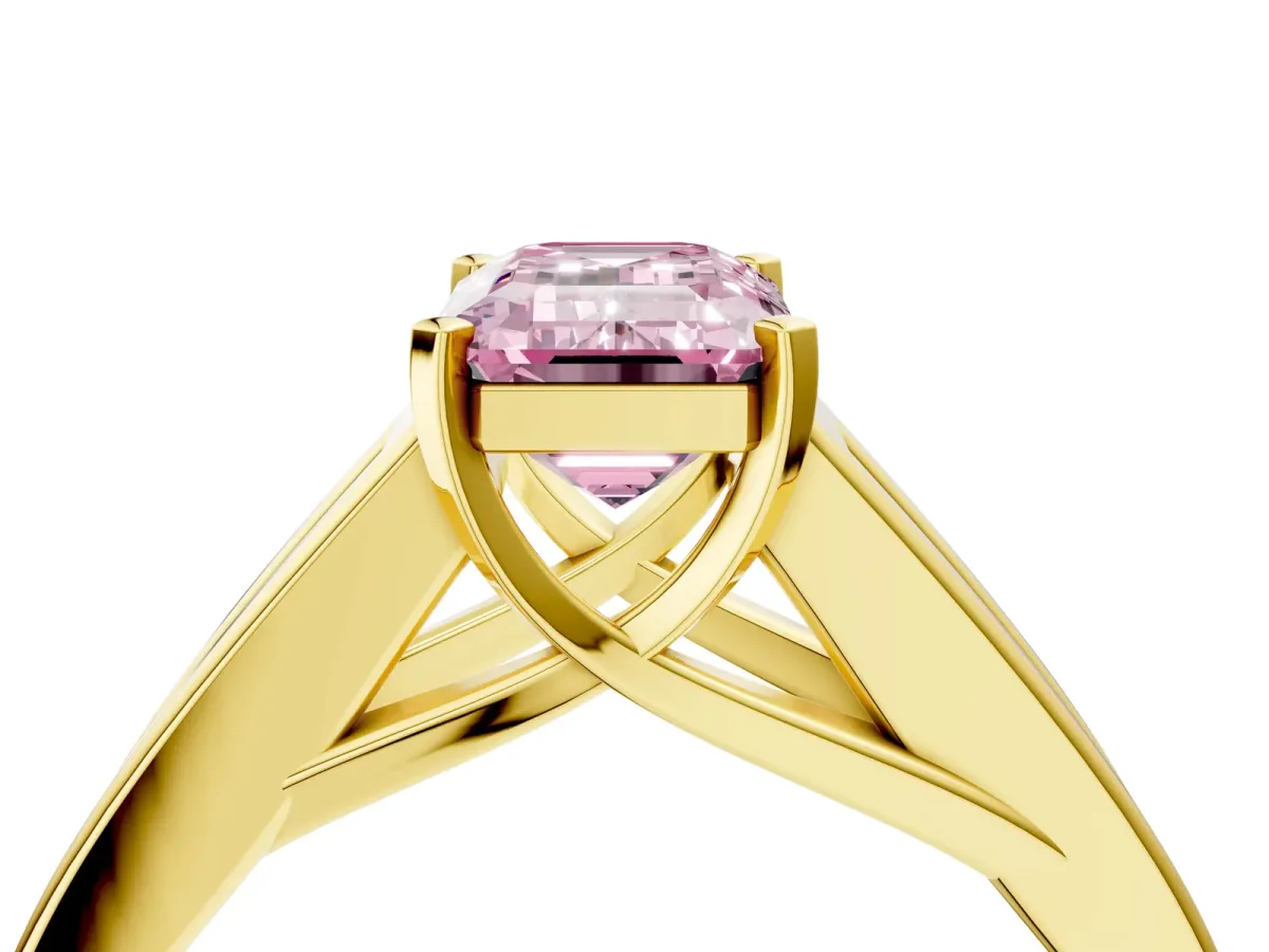 Fancy Pink Emerald Cut Cut Channel Set Solitaire Ring with Four-Prong Setting Yellow gold