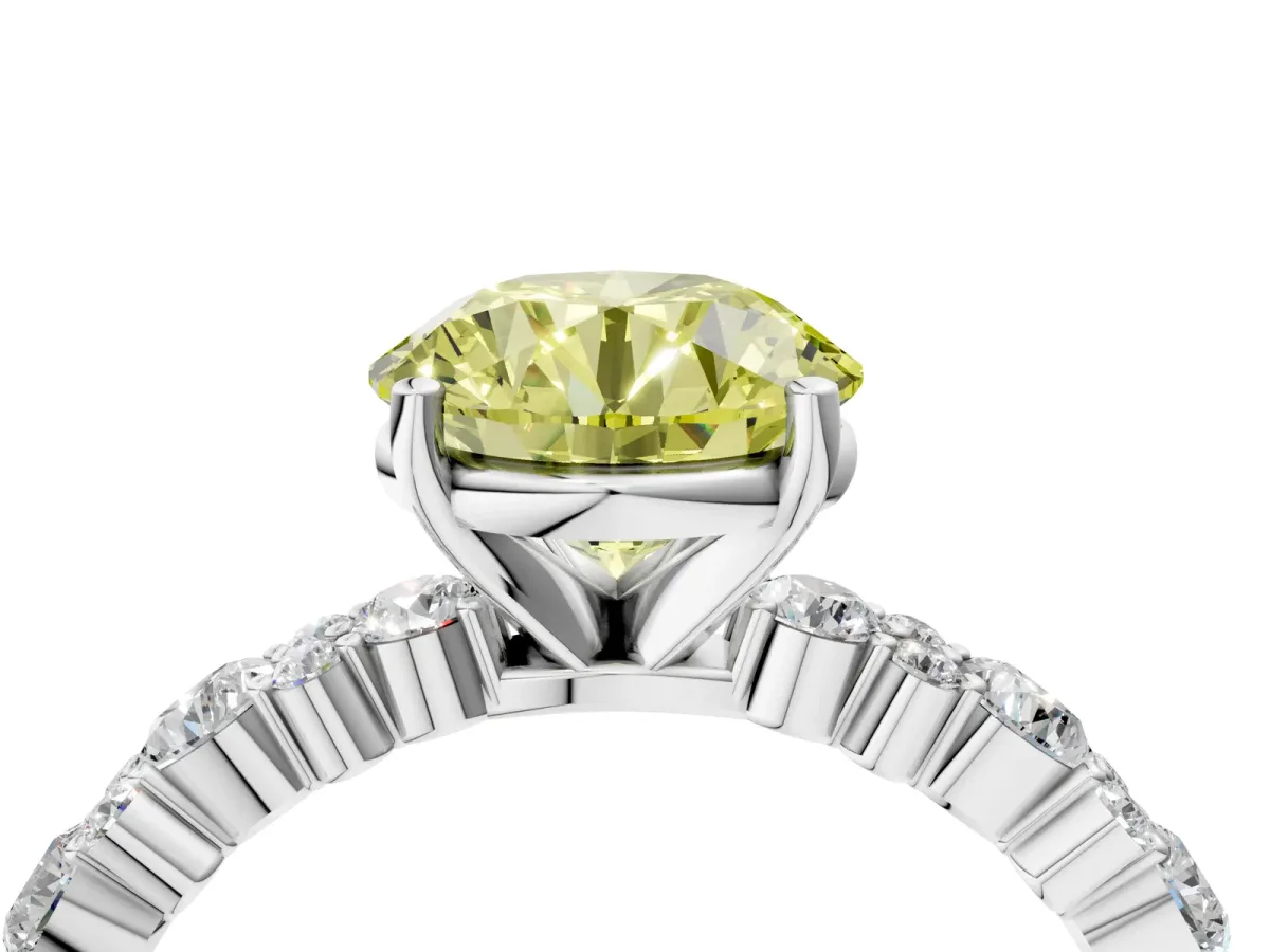 Fancy Yellow Round Cut Diamond Side Stone Solitaire Ring with Round and Four-Prong Setting White gold