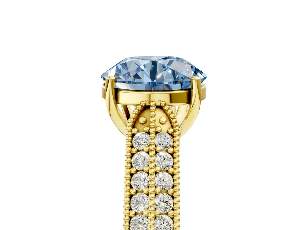 Fancy Blue Round Cut Cut Pave Split Shank Engagement Ring with Four-Prong Setting Yellow gold