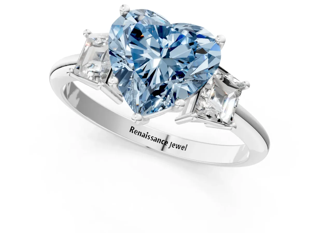 Fancy Blue Heart Cut Diamond Three-Stone Ring with Trapezoid Side Stones and Prong Setting Silver