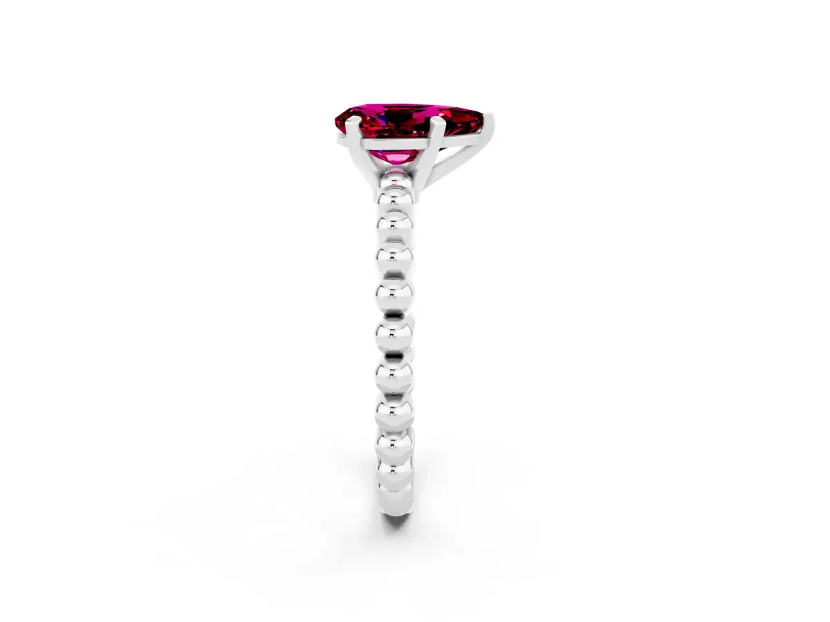 Pear Cut Garnet Solitaire Ring with Beaded Band and Prong Setting Silver
