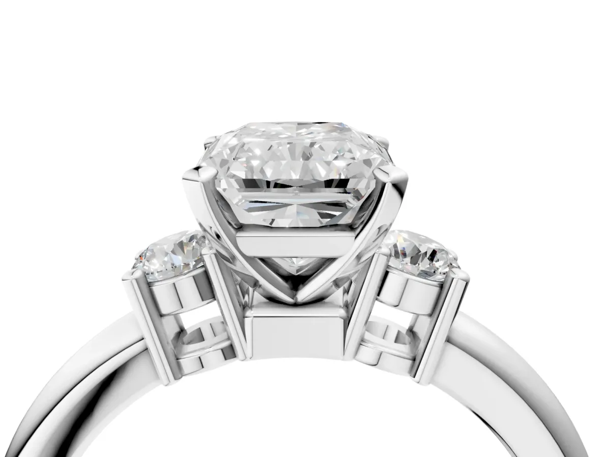 Three-Stone Radiant Cut Cut Diamond Solitaire with Prong Setting and Classic Band Platinum