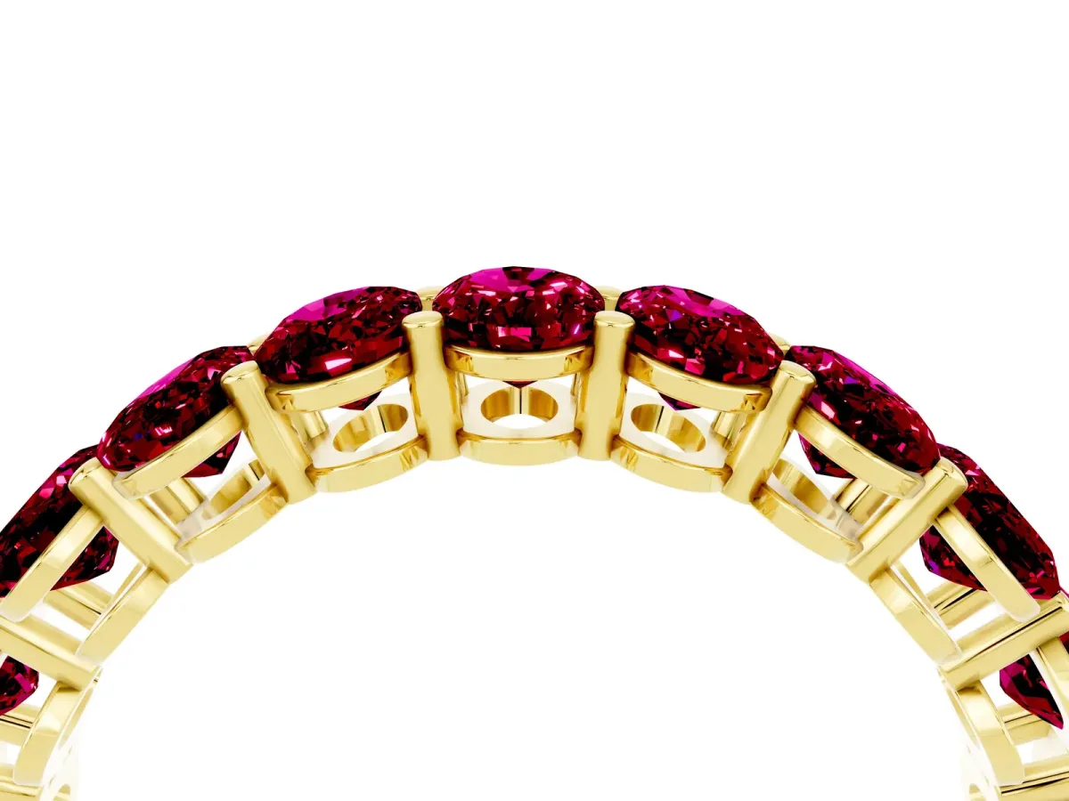 Oval Cut Garnet Eternity Band with Shared Prong Setting Yellow gold