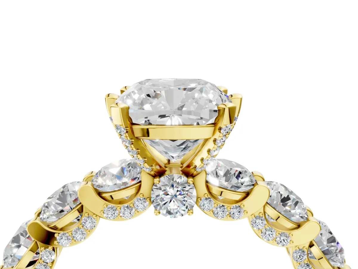 Cushion Cut Diamond Side Stone Engagement Ring with Four-Prong Setting Yellow gold
