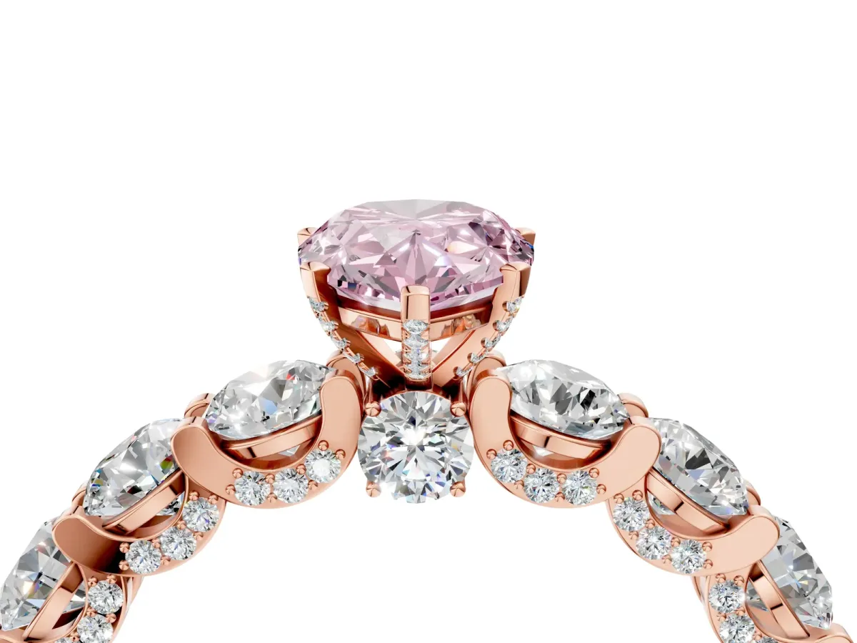 Fancy Pink Pear Cut Diamond Side Stone Engagement Ring with Four-Prong Setting Rose gold