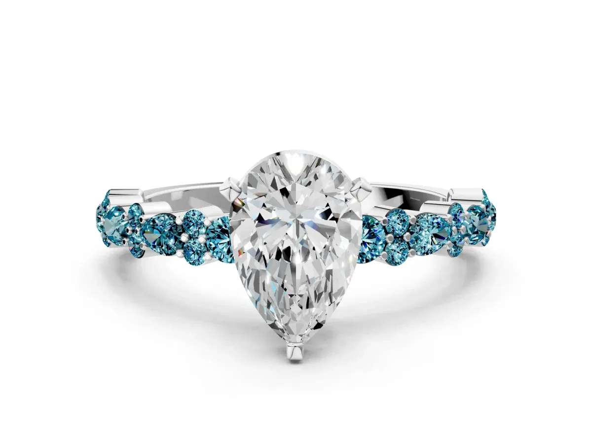 Pear Cut Diamond Side Stone Solitaire Ring with Round Blue Topaz and Four-Prong Setting Platinum