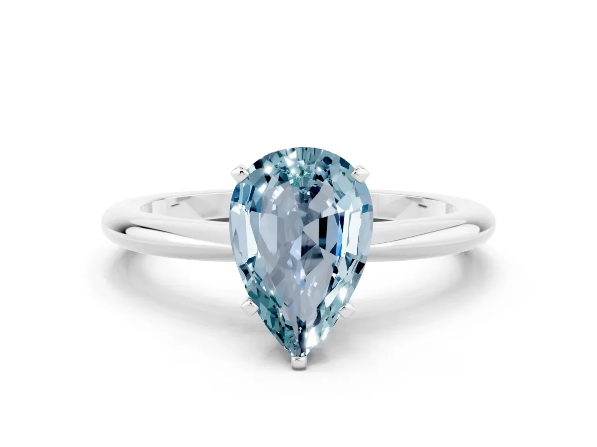 Pear Cut Aquamarine Solitaire Ring with Six-Prong Setting and Classic Band Silver