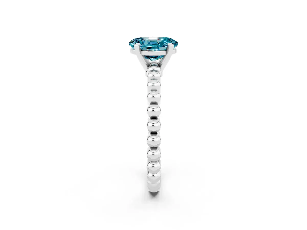 Oval Cut Blue Topaz Solitaire Ring with Beaded Band and Prong Setting Silver