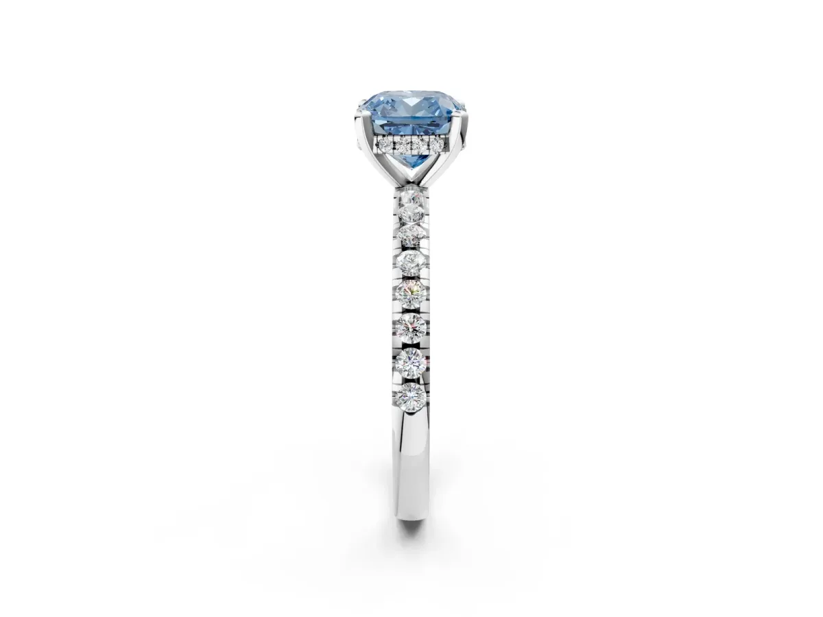 Fancy Blue Cushion Cut Diamond Solitaire Ring with Round Pavé Band and Four-Prong Setting Silver