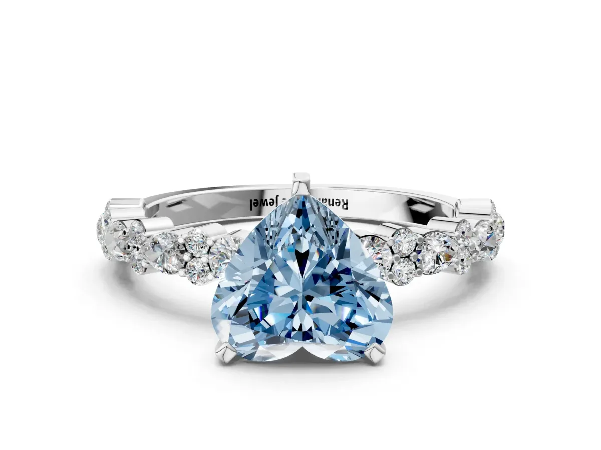 Fancy Blue Heart Cut Diamond Side Stone Solitaire Ring with Round and Four-Prong Setting Silver