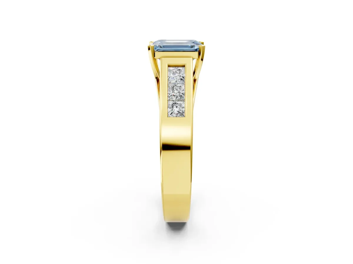 Fancy Blue Emerald Cut Cut Channel Set Solitaire Ring with Four-Prong Setting Yellow gold