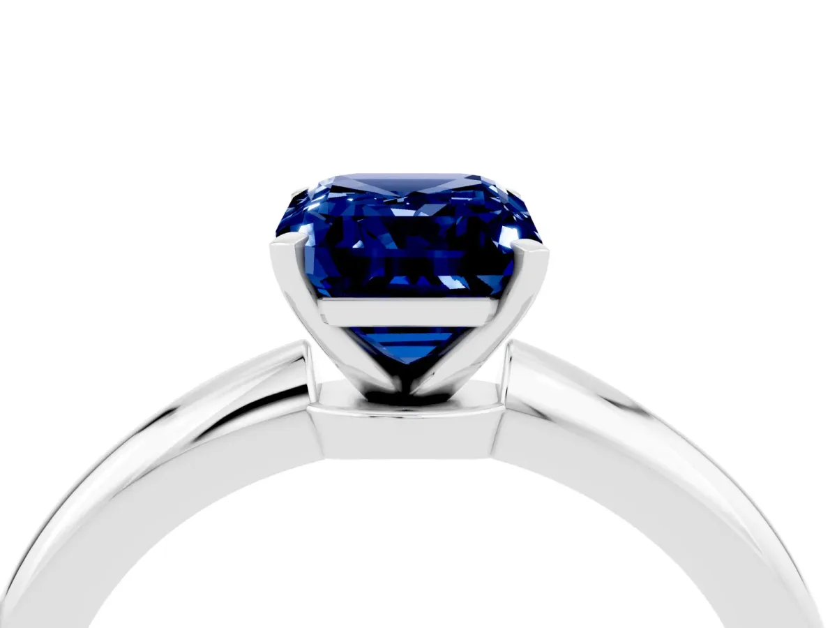 Emerald Cut Blue Sapphire Solitaire Ring with Six-Prong Setting and Classic Band Platinum