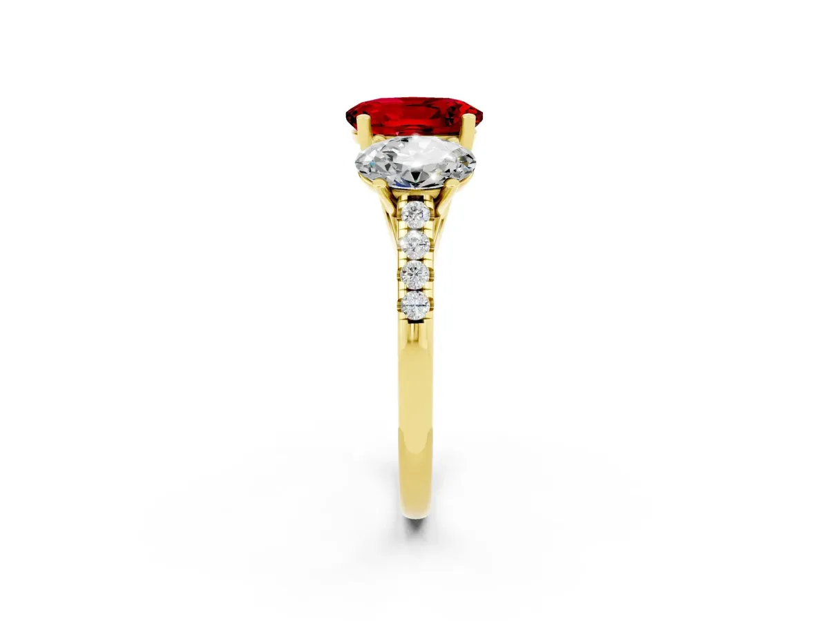 Three-Stone Oval Cut Ruby Ring with Round Pavé Band and Prong Setting Yellow gold