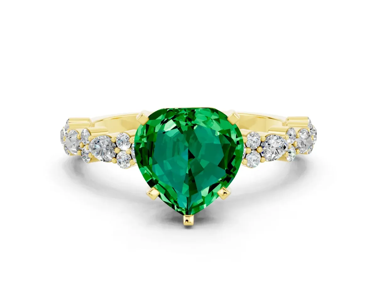 Heart Cut Emerald Side Stone Solitaire Ring with Round and Four-Prong Setting Yellow gold