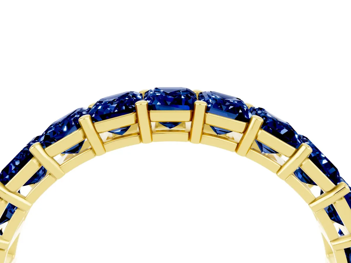 Emerald Cut Blue Sapphire Eternity Band with Shared Prong Setting Yellow gold