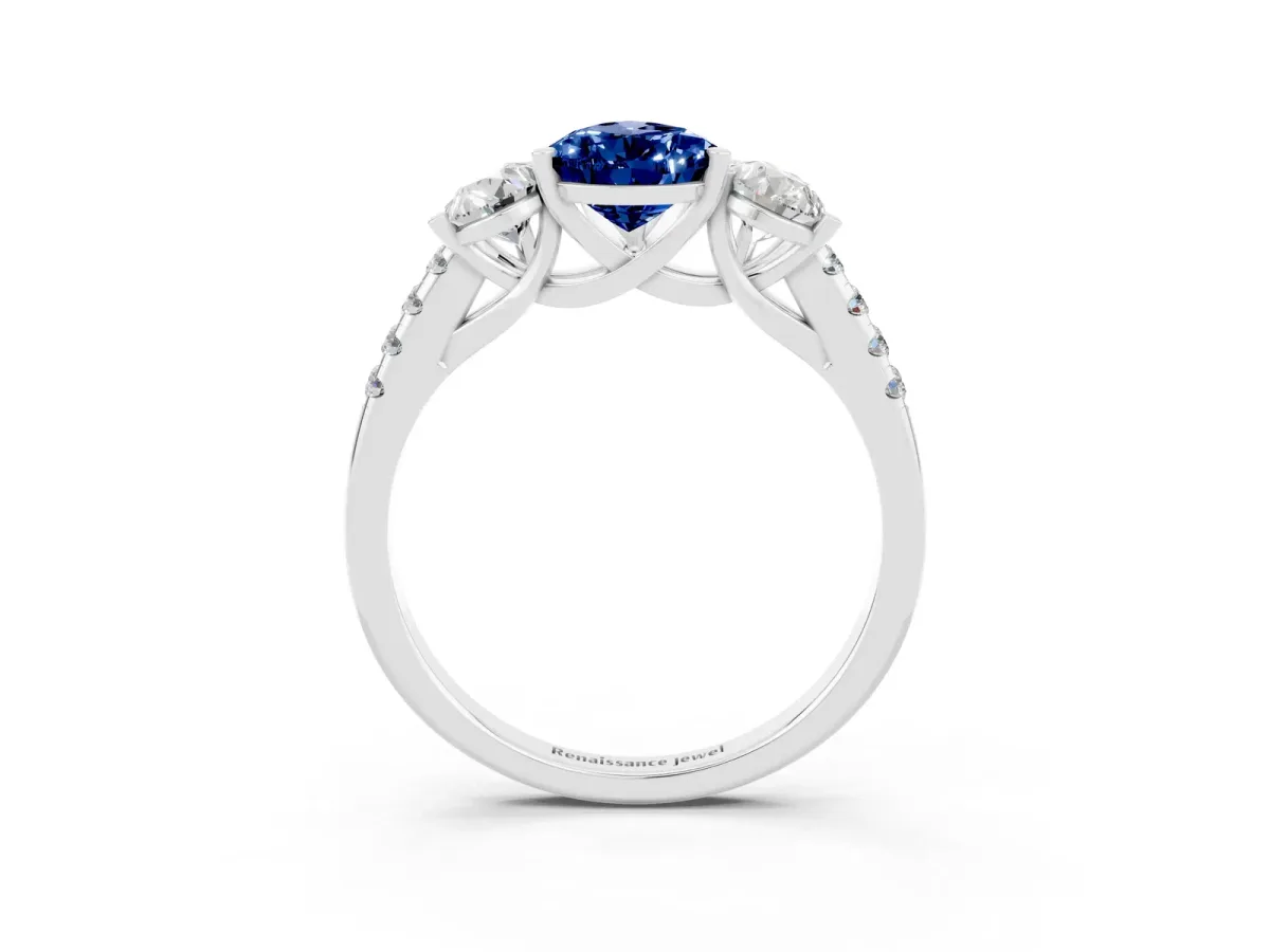 Three-Stone Pear Cut Blue Sapphire Ring with Round Pavé Band and Prong Setting Silver