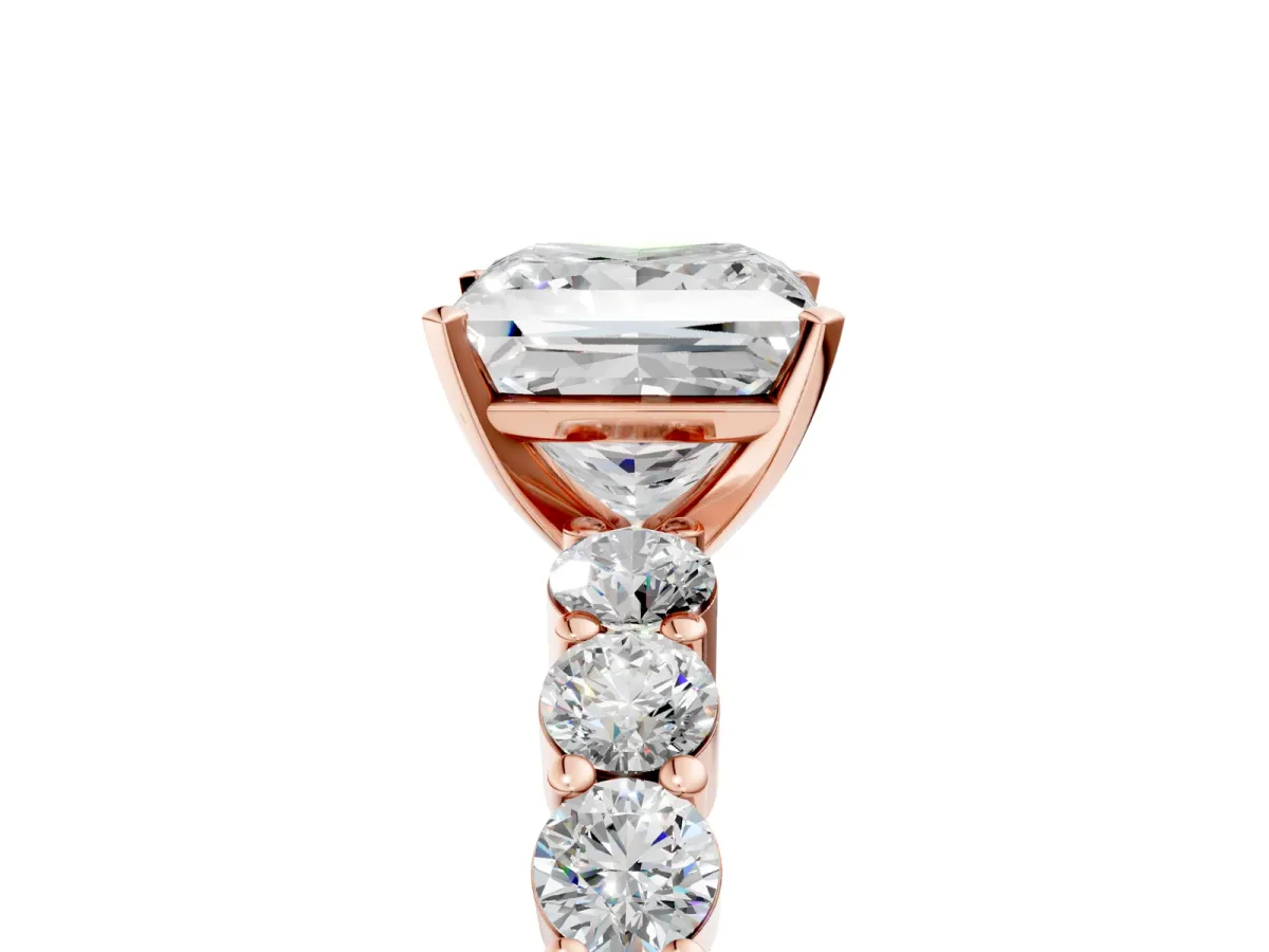 Princess Cut Diamond Solitaire Ring with Shared Prong Round Side Stones Rose gold
