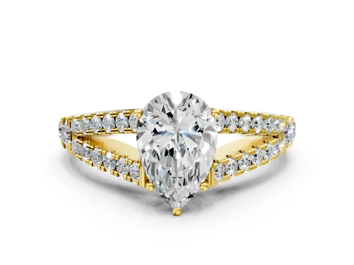Pear Cut Diamond Split Shank Pavé Engagement Ring with Four-Prong Setting Yellow gold