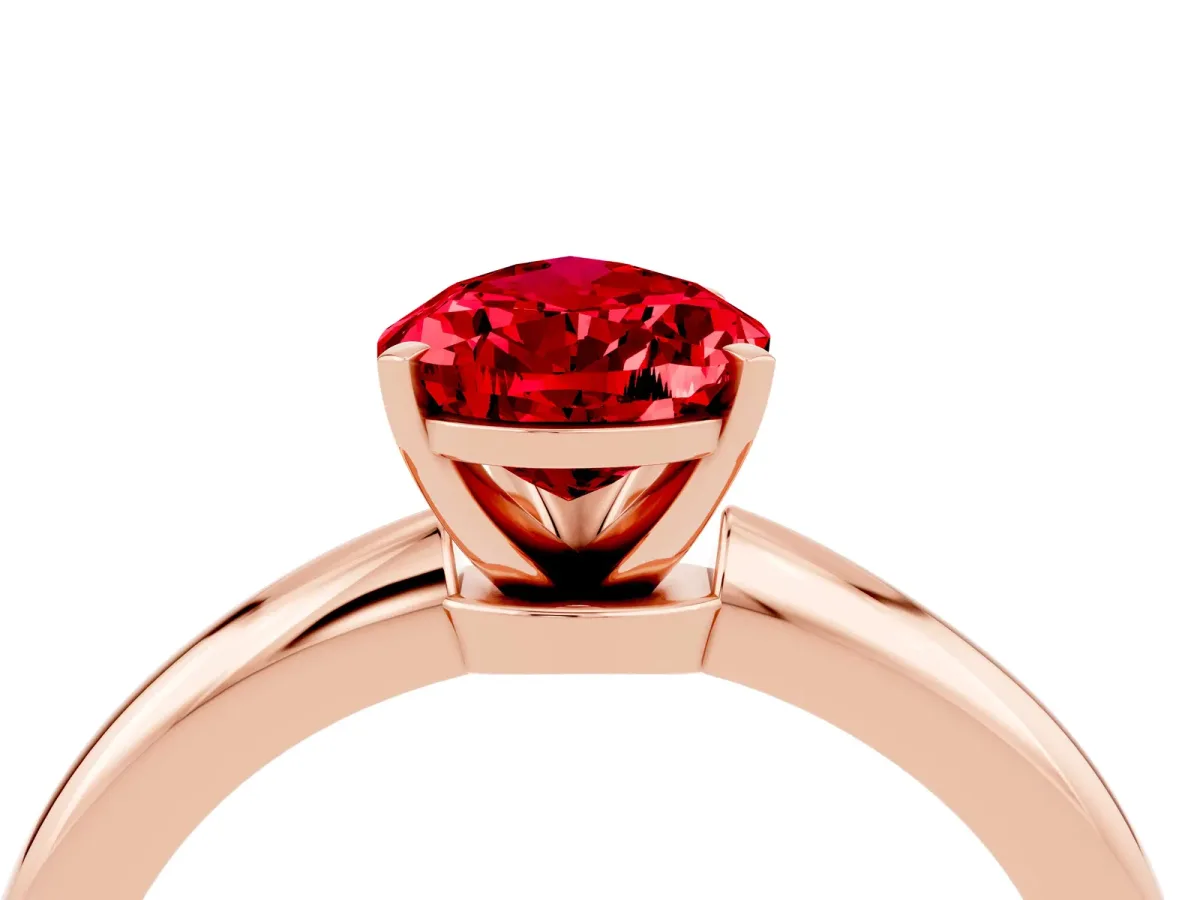Pear Cut Ruby Solitaire Ring with Six-Prong Setting and Classic Band Rose gold
