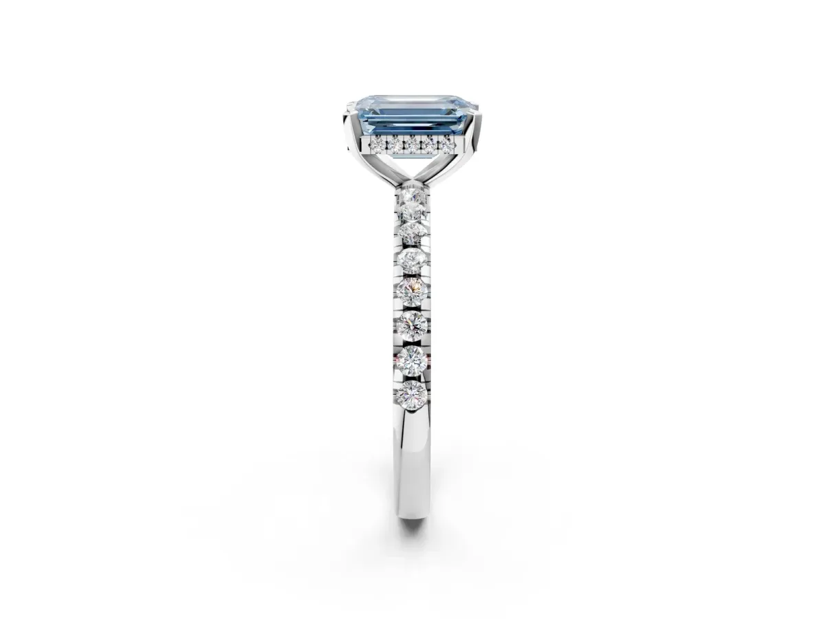 Fancy Blue Emerald Cut Diamond Solitaire Ring with Round Pavé Band and Four-Prong Setting Silver