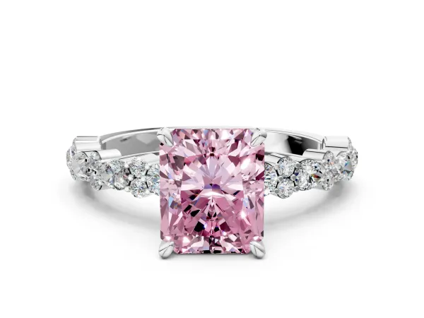 Fancy Pink Radiant Cut Diamond Side Stone Solitaire Ring with Round and Four-Prong Setting Platinum