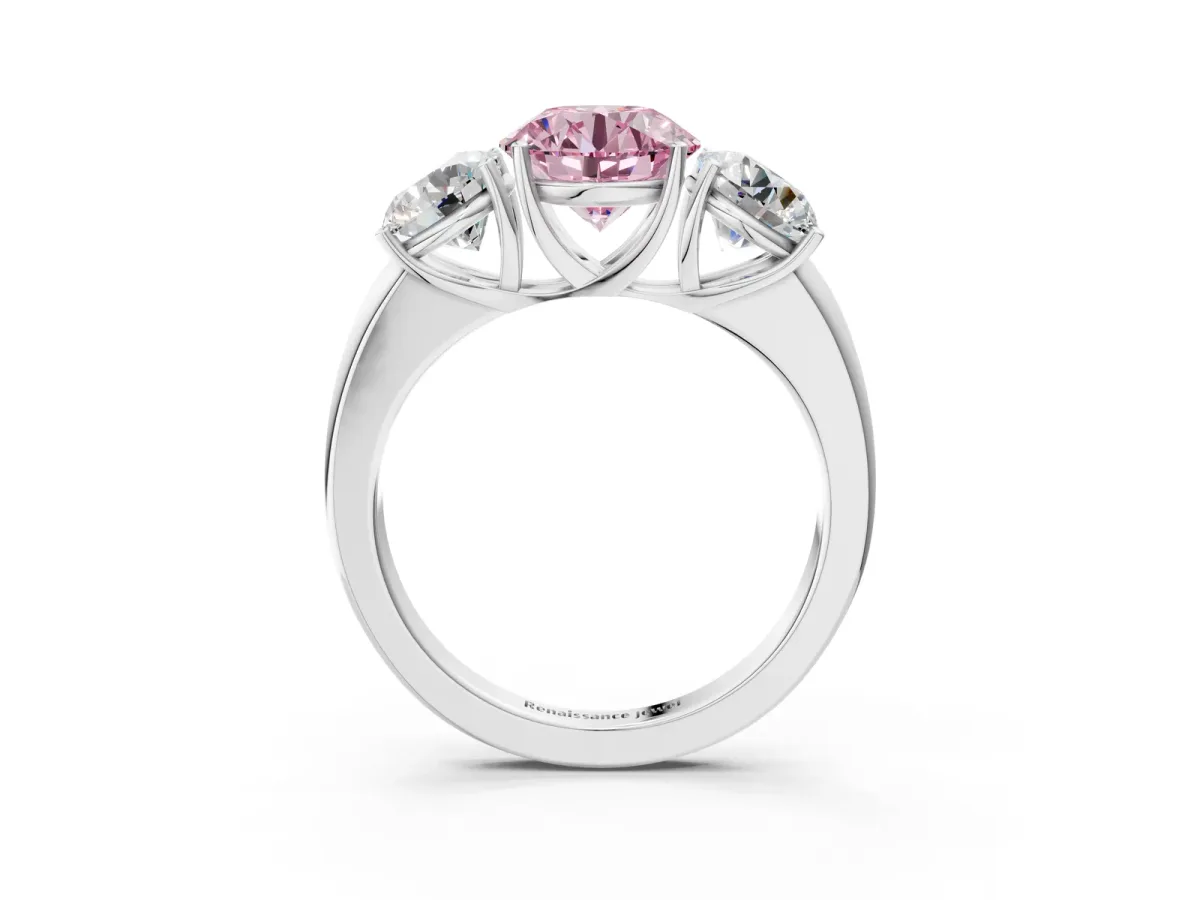 Fancy Pink Round Cut Diamond Three-Stone Ring with Four-Prong Setting and Classic Band Platinum