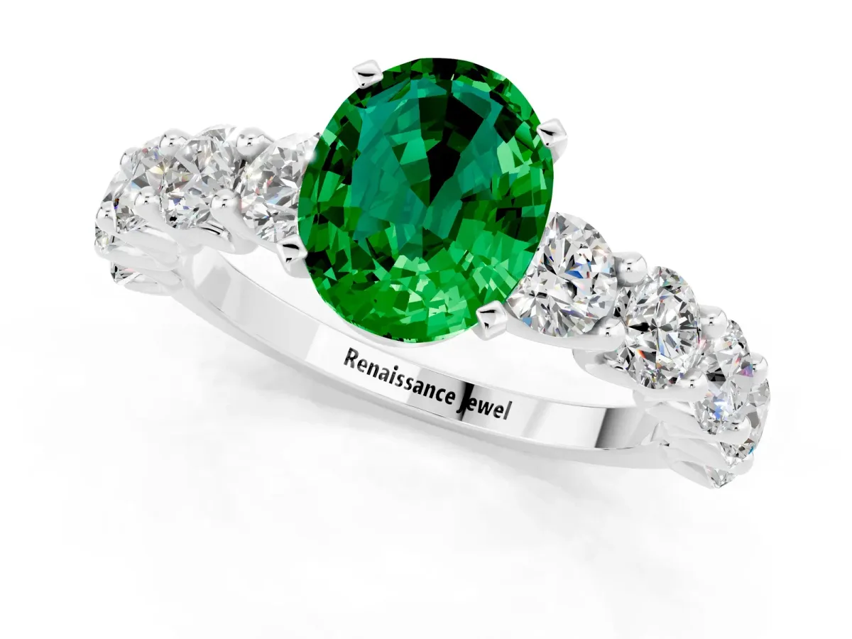 Oval Cut Emerald Prong Setting with Side Stones on a Pave Band Platinum