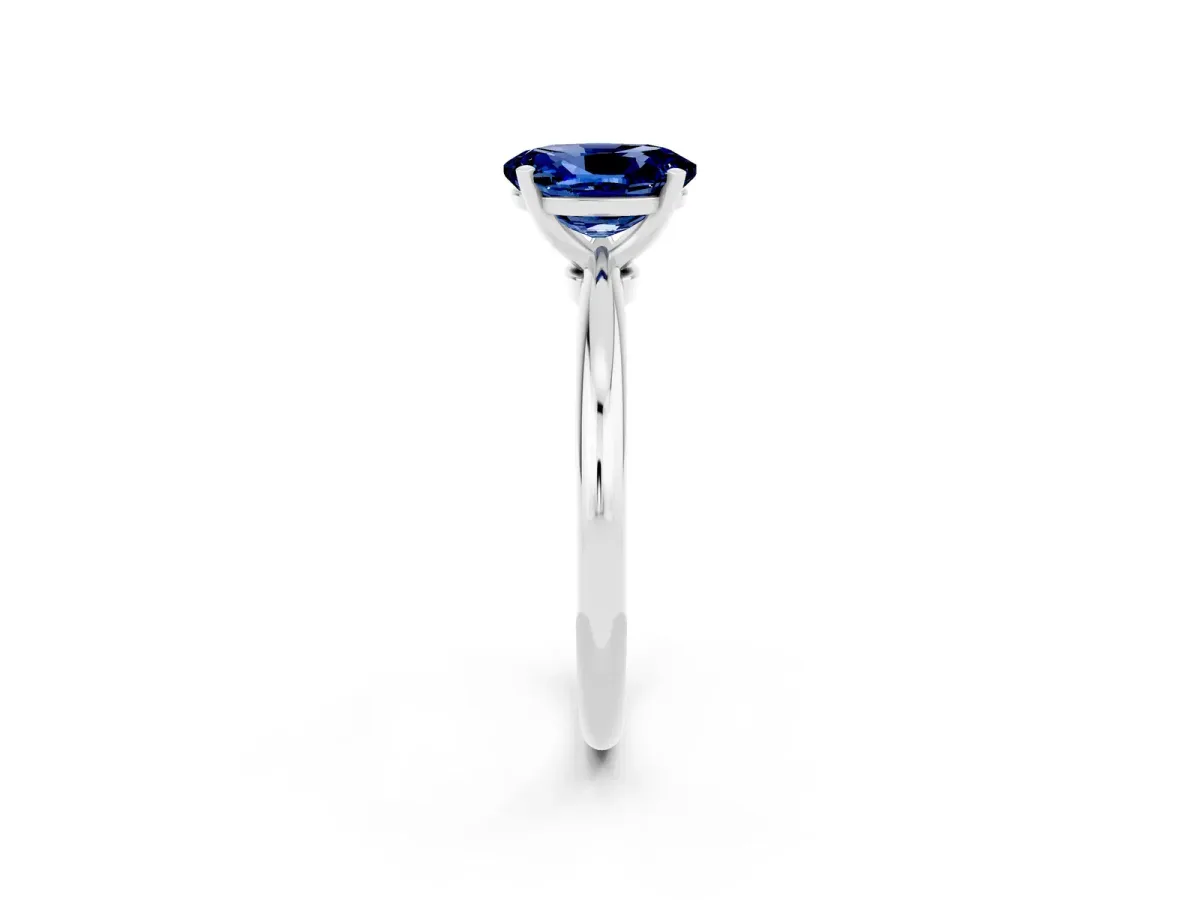 Oval Cut Blue Sapphire Solitaire Ring with Six-Prong Setting and Classic Band Platinum