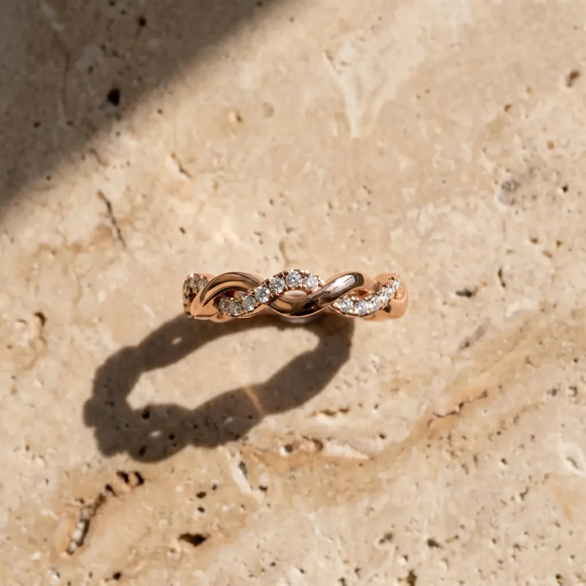 Pavé Round Diamond Twist Eternity Band with Shared Prong Setting Rose gold