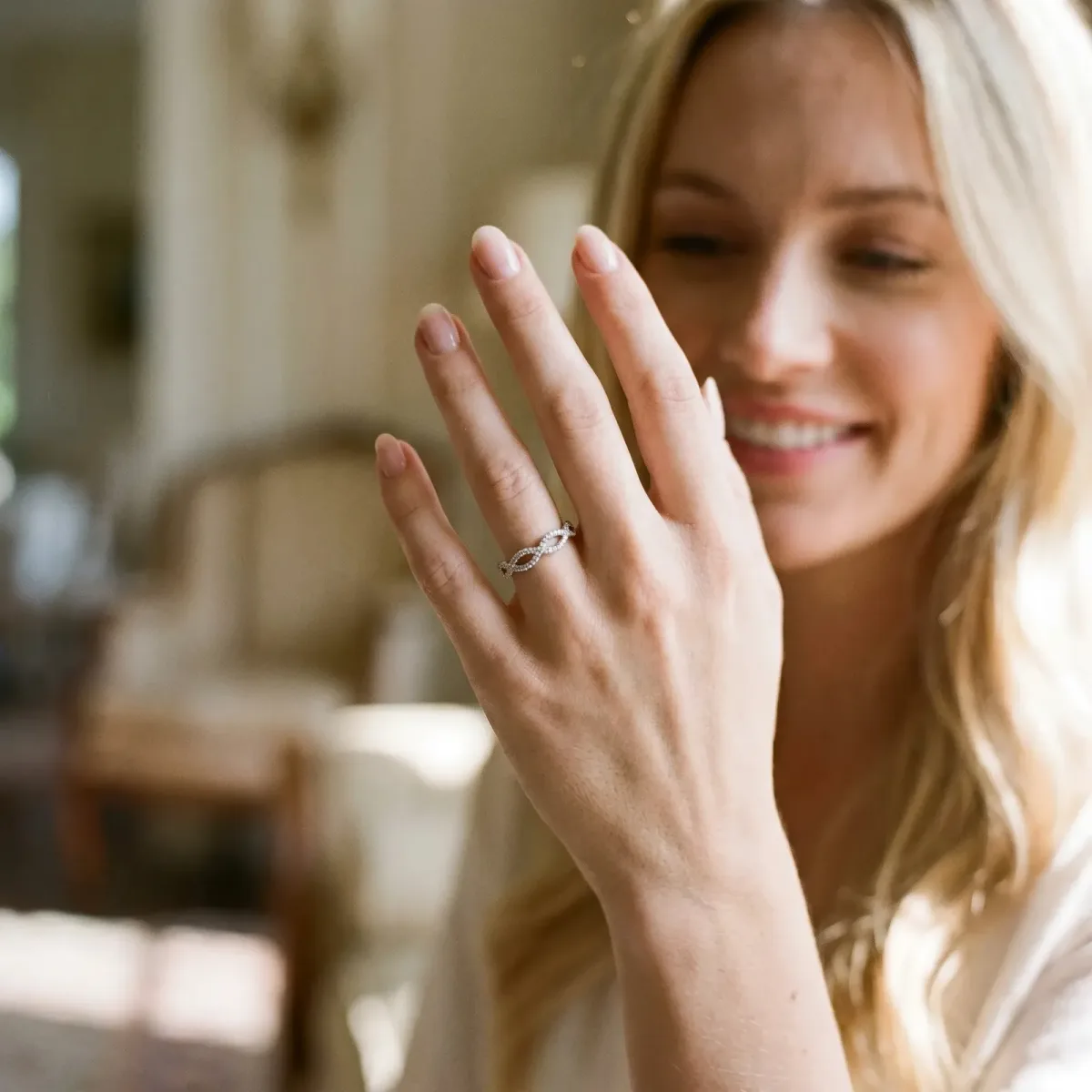 Infinity Twist Diamond Pavé Band with Round Stones and Prong Setting Silver