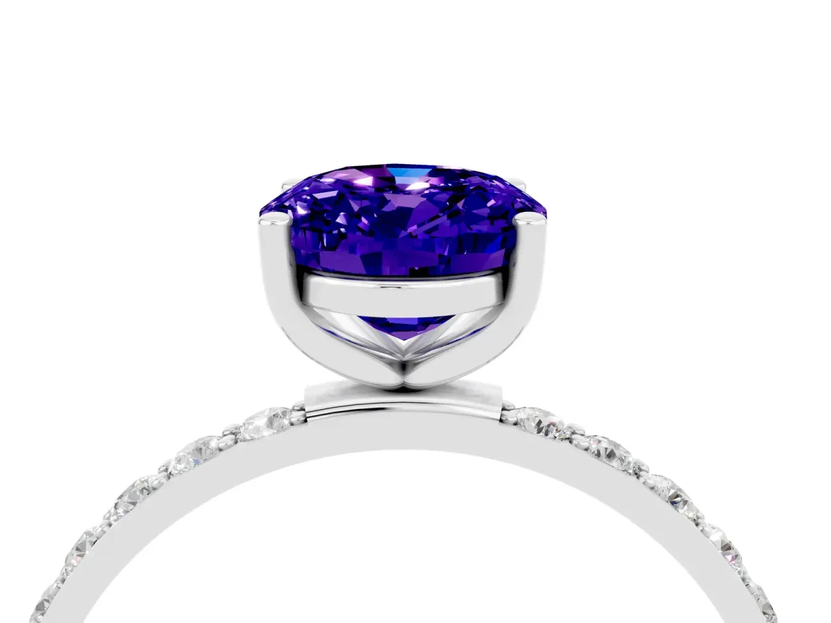 Oval Cut Tanzanite Solitaire Ring with Round Pavé Band and Prong Setting Silver