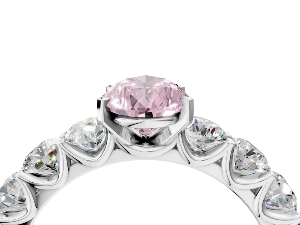 Fancy Pink Pear Cut Diamond Prong Setting with Side Stones on a Pave Band Silver