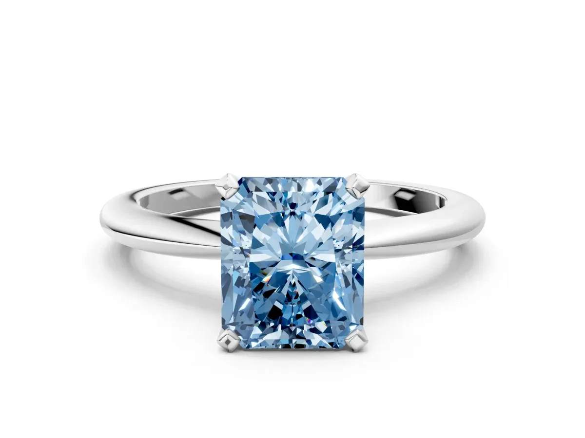 Fancy Blue Radiant Cut Diamond Solitaire Ring with Six-Prong Setting and Classic Band Silver