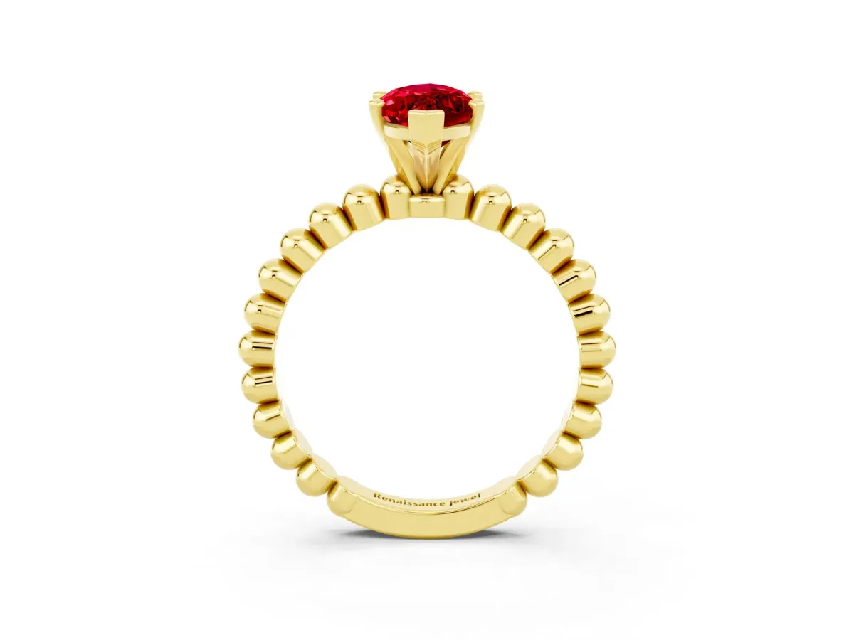 Marquise Cut Ruby Solitaire Ring with Beaded Band and Prong Setting Yellow gold