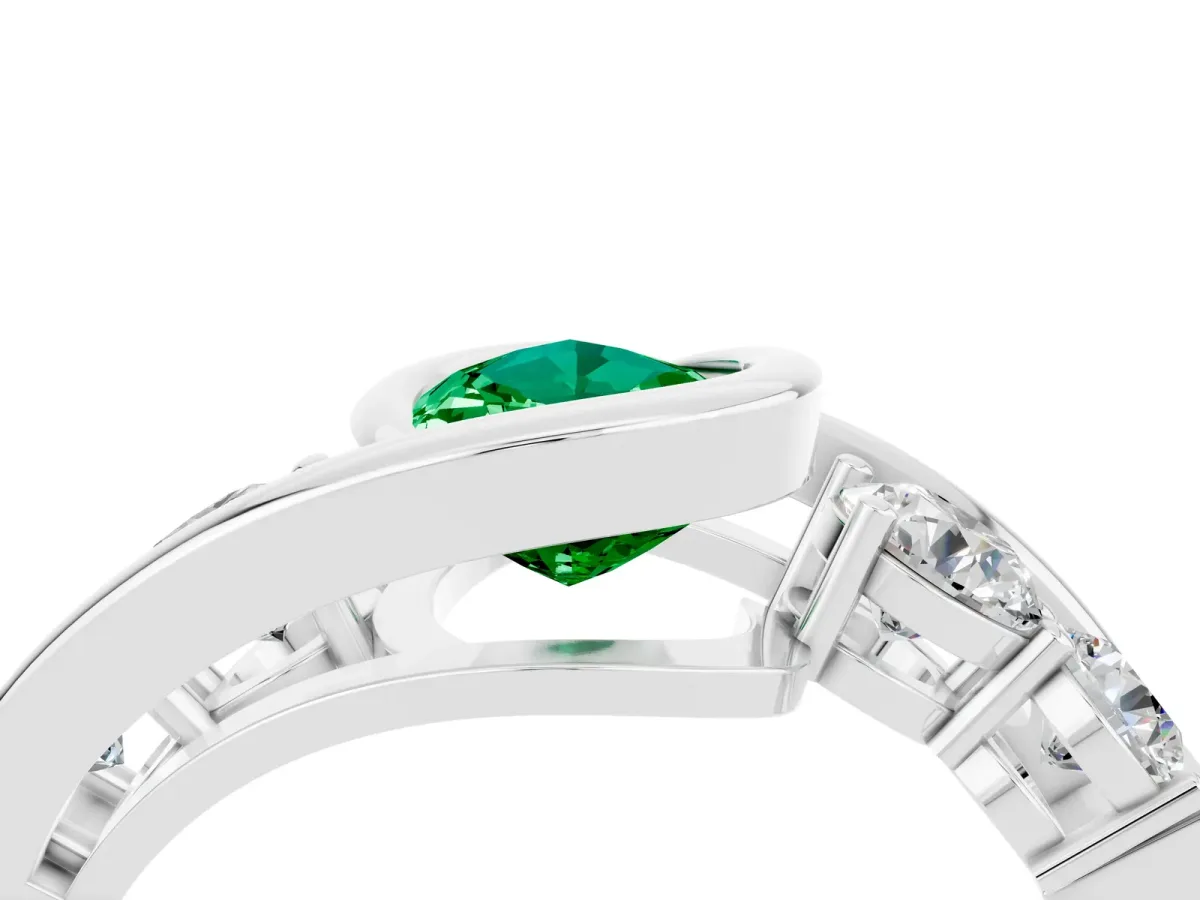 Bezel Set Pear Cut Emerald Bypass Ring with Round Accents Platinum