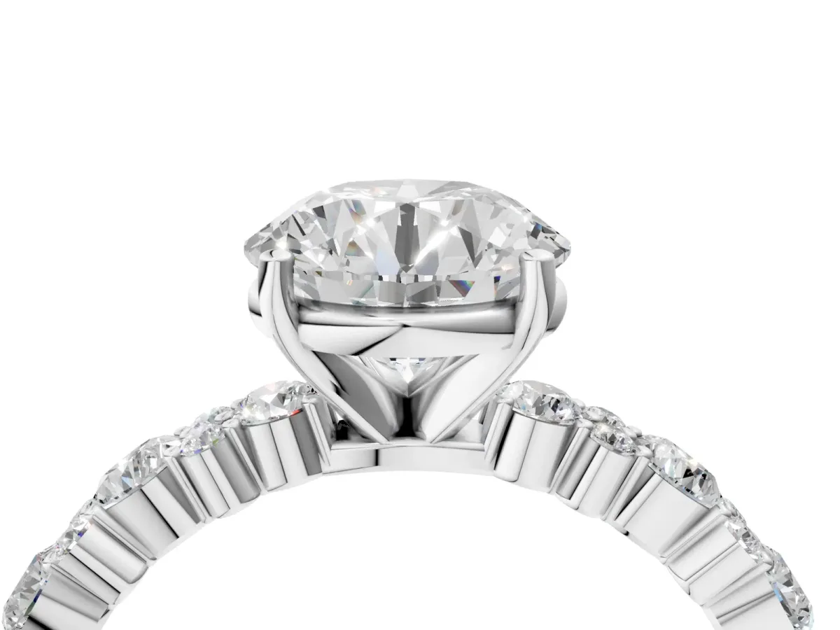 Round Cut Diamond Side Stone Solitaire Ring with Round and Four-Prong Setting White gold