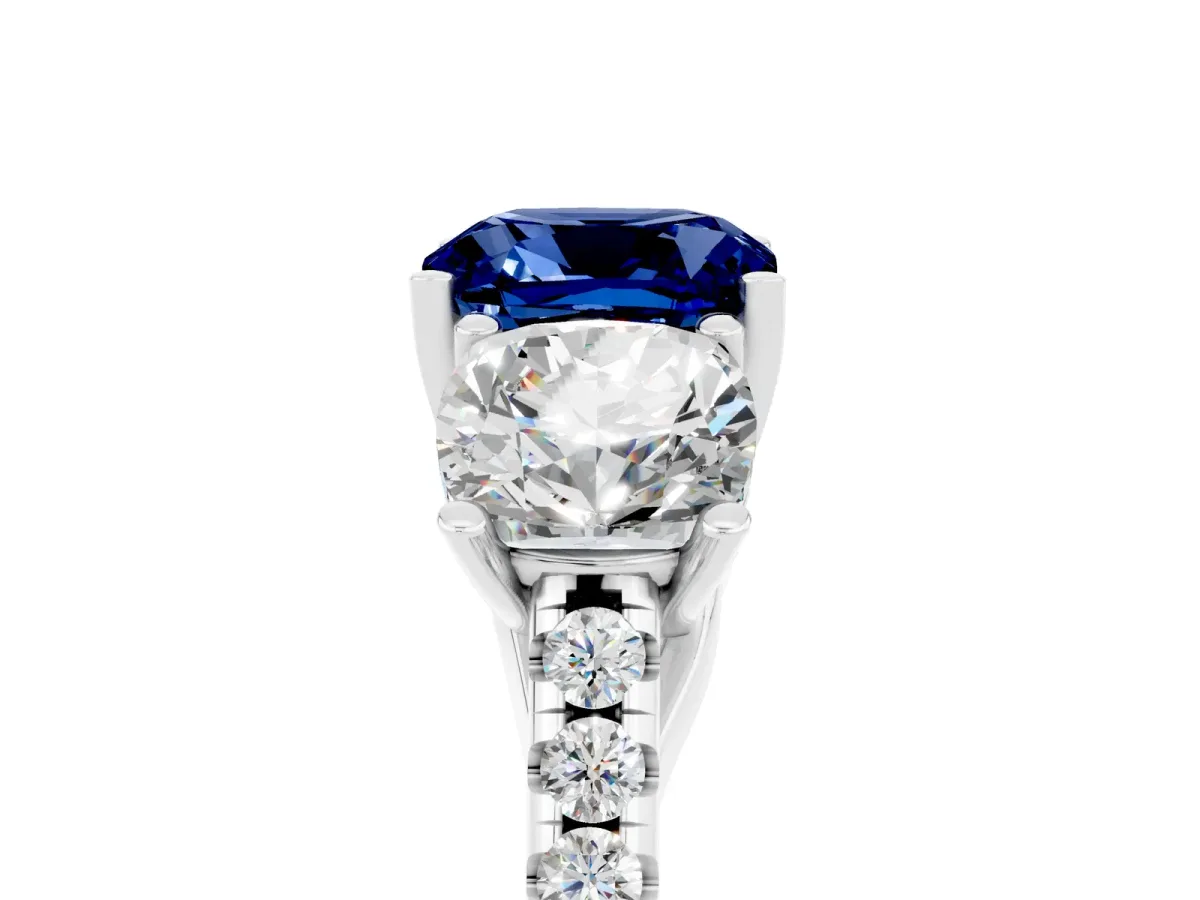 Three-Stone Cushion Cut Blue Sapphire Ring with Round Pavé Band and Prong Setting Silver